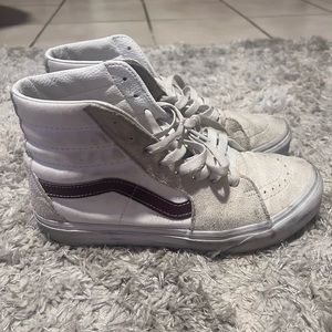 Cream and brown colored vans